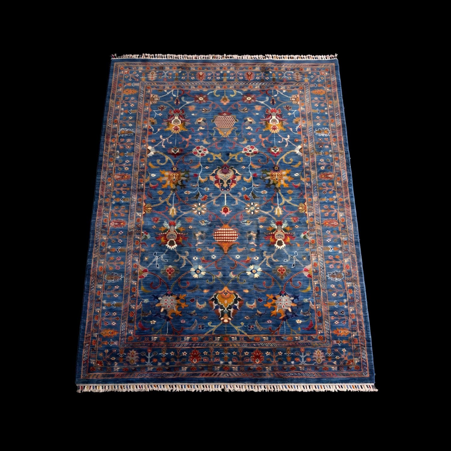 The same blue rug photographed with the light from a different side — Light from the right