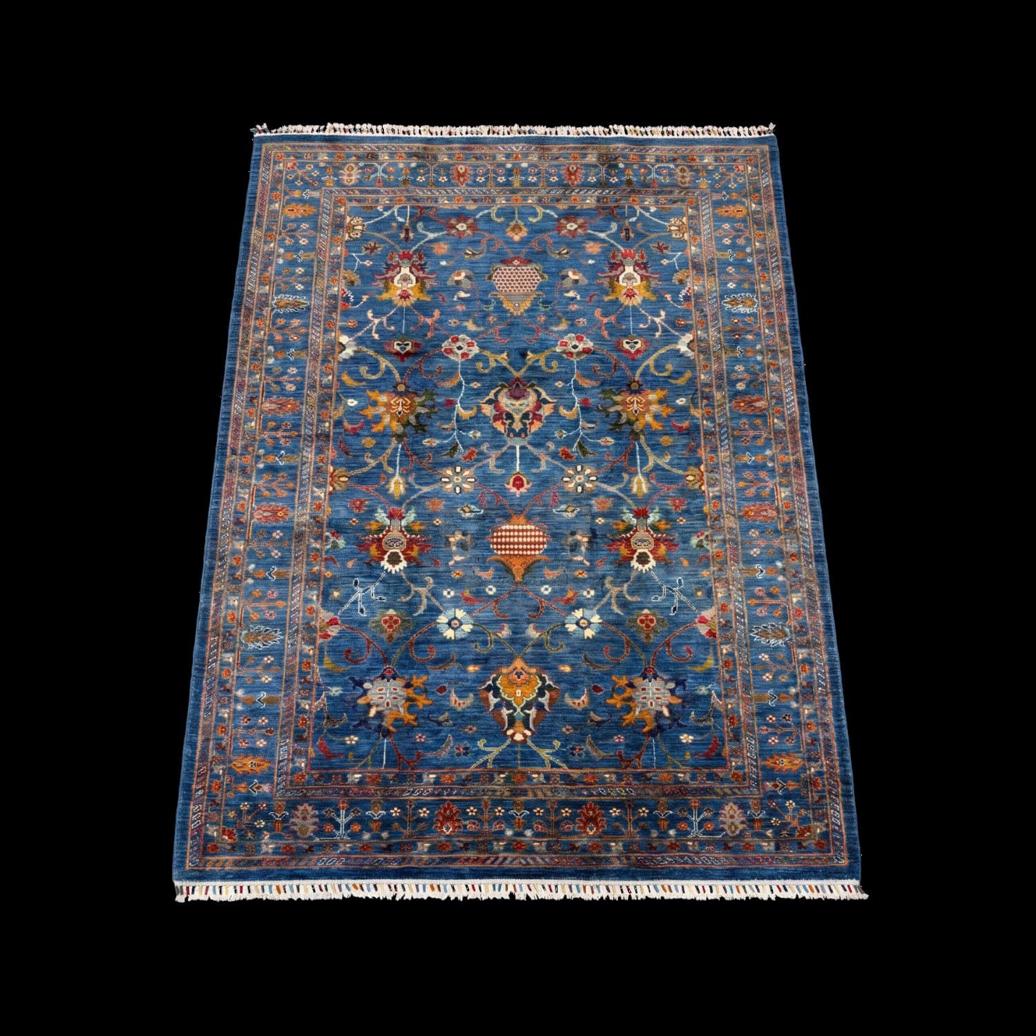 The same blue rug photographed with the light from a different side — Light from above